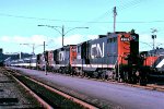 CN 4823, 4404, 4822 coupled to a passenger consist at CN station.